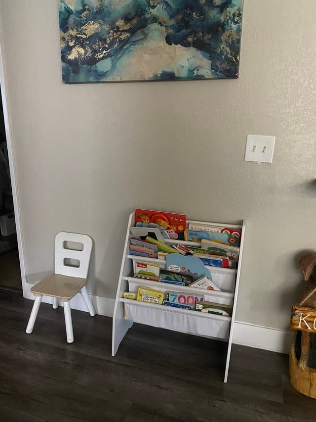 picture of a shelf full of games and books in a daycare